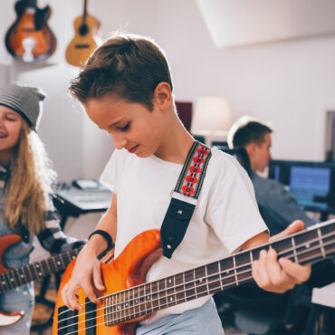 Kids,Rock,Band,Playing,In,Studio